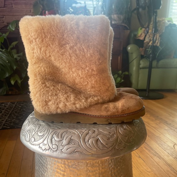UGG Shoes - Vintage UGGS a with shearling on the inside and outside.They need to be cleaned
